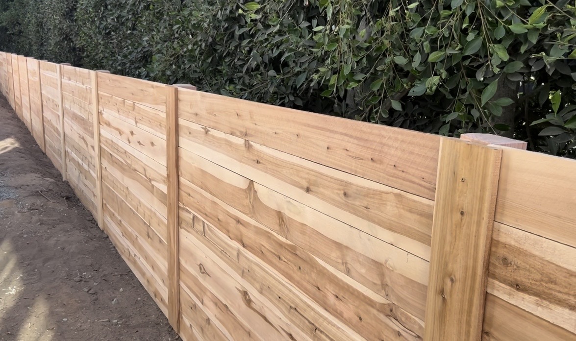 Horizontal cedar board privacy fence